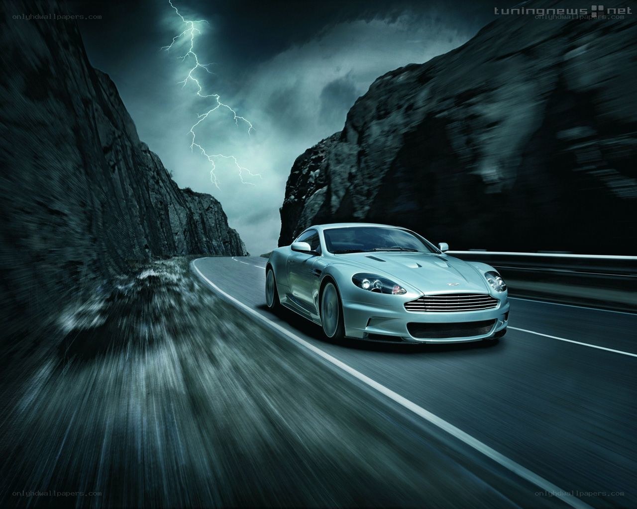 Aston Martin on stormy road