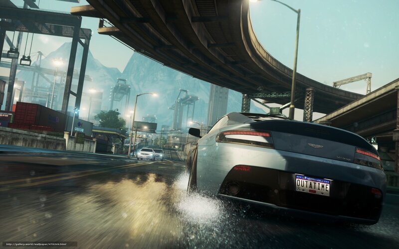 Aston Martin on wet city street