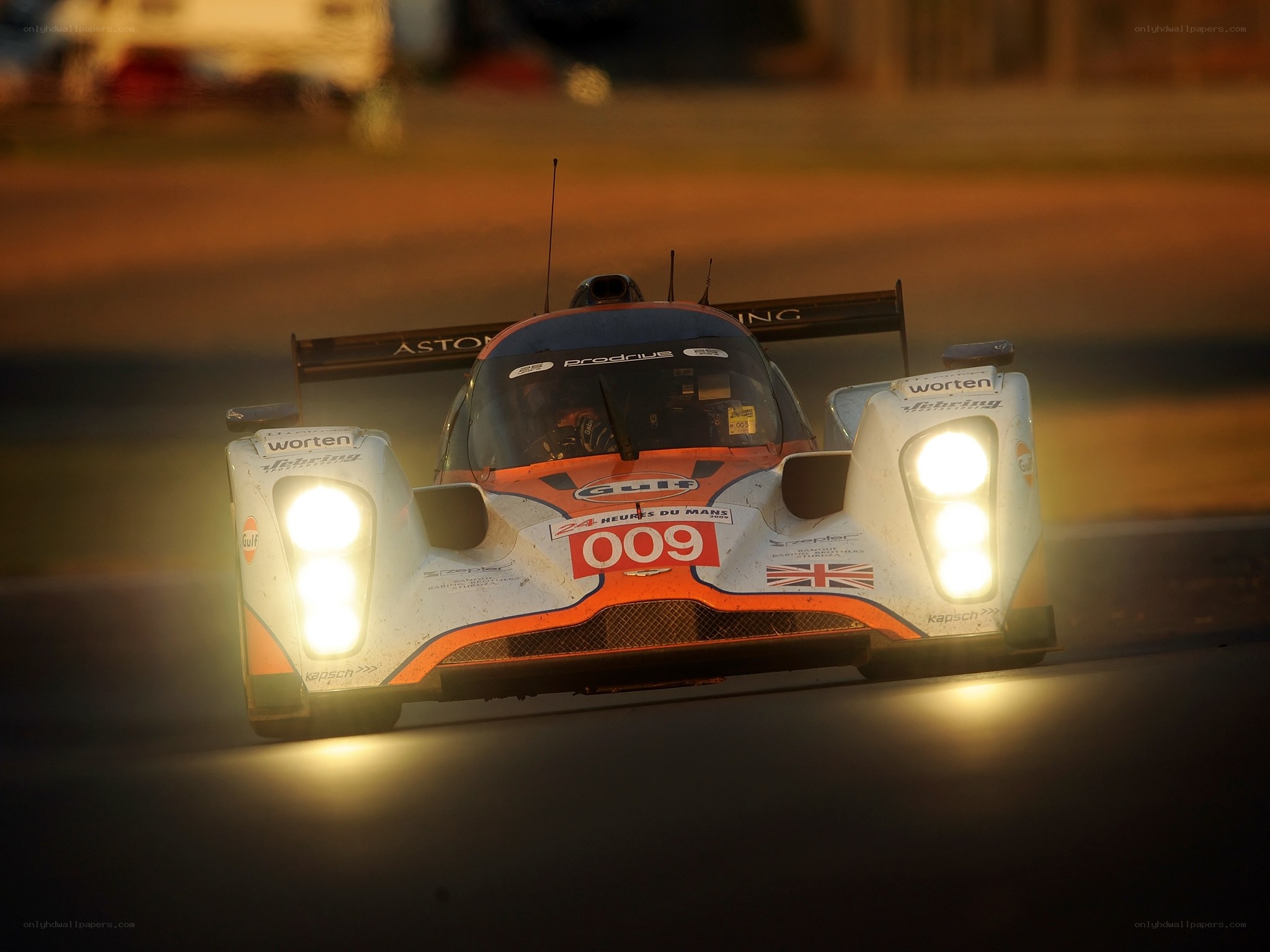 Aston Martin race car at night