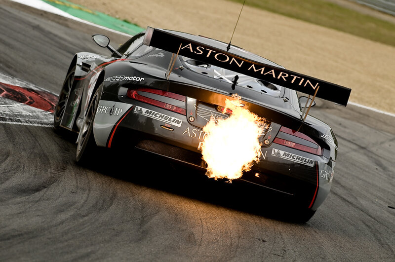 Aston Martin race car with flames