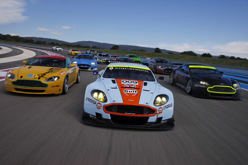 Aston Martin race cars on track