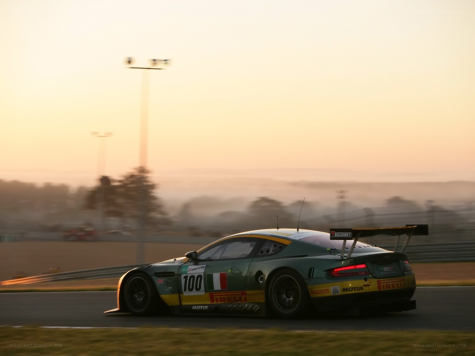 Aston Martin racing at dawn