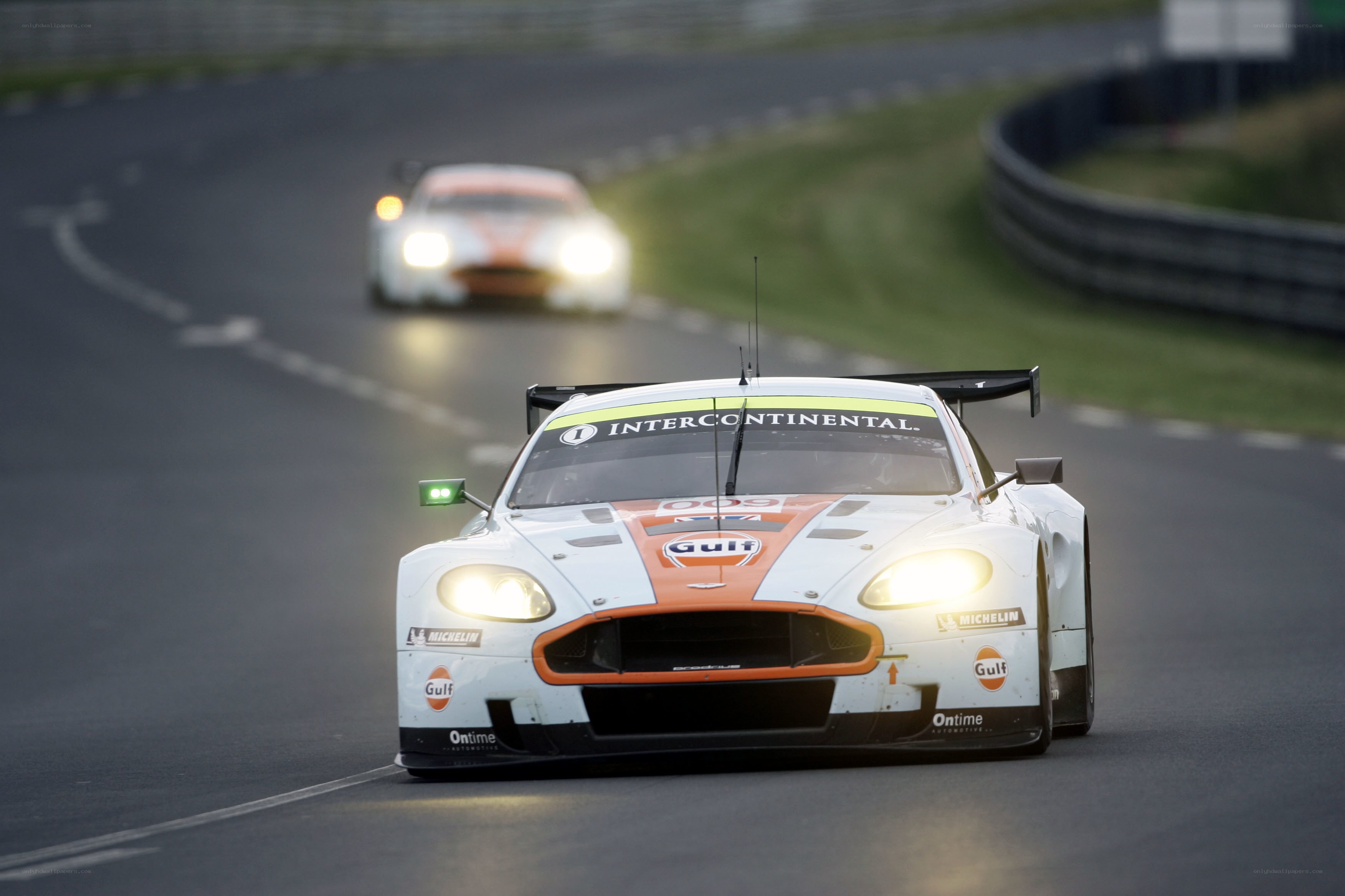 Aston Martin racing on a track