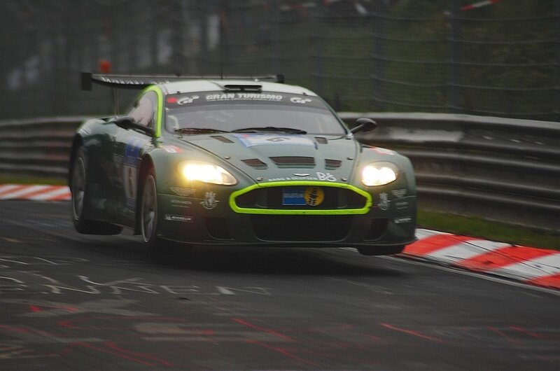Aston Martin racing on a track