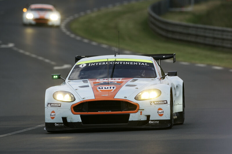 Aston Martin racing on a track