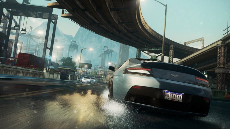Aston Martin racing on wet road