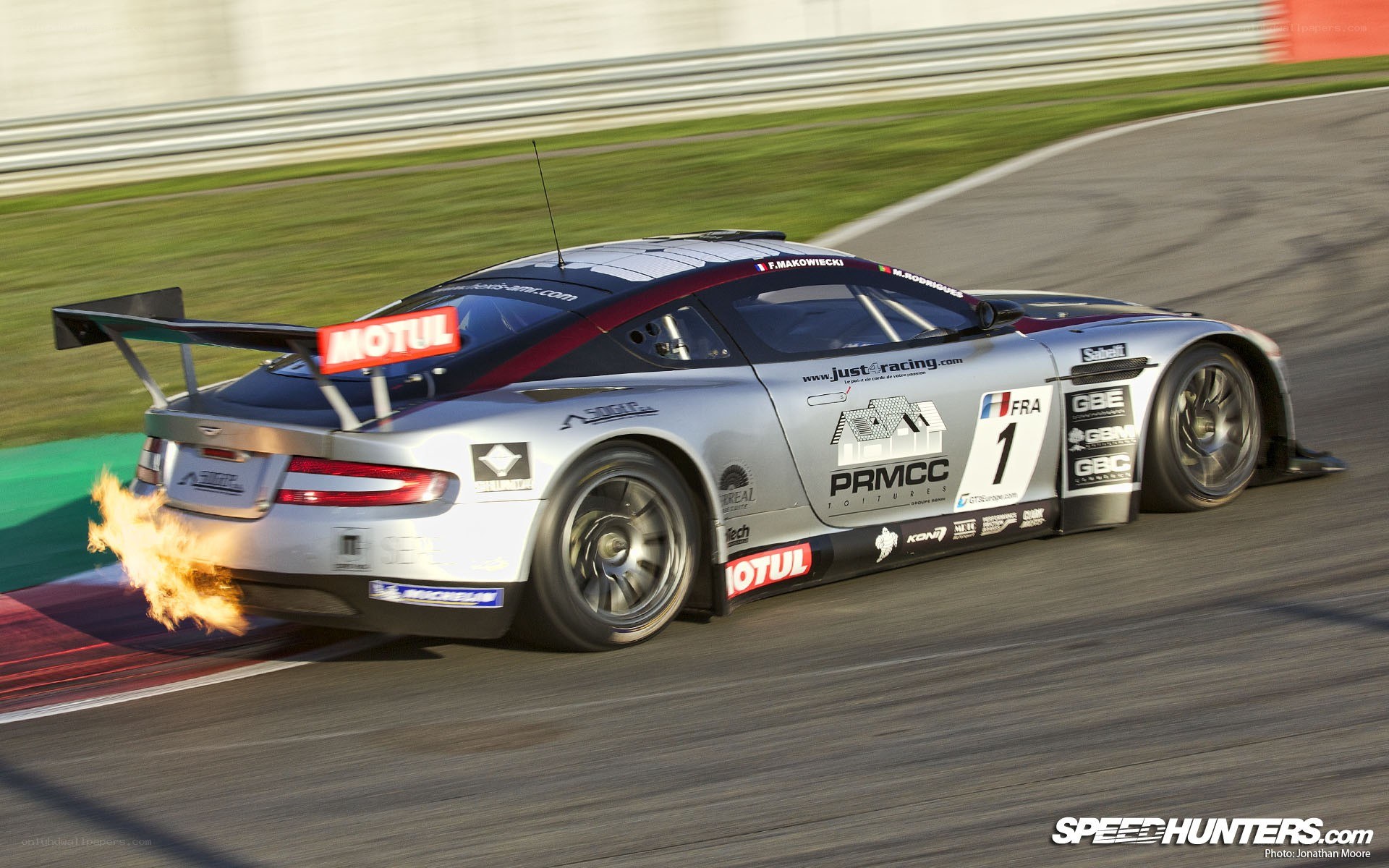Aston Martin racing with flames