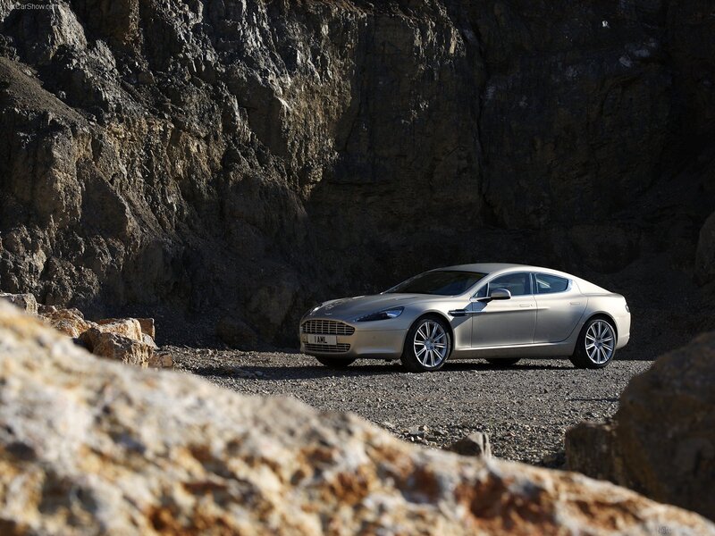 Aston Martin Rapide in a rocky landscape