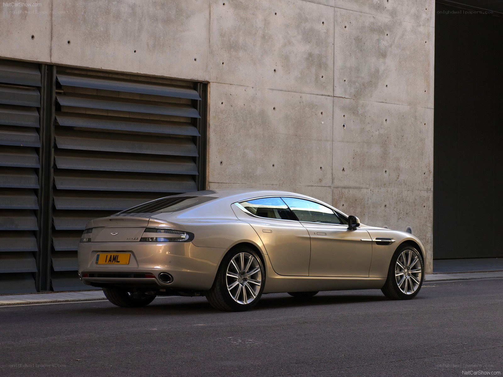 Aston Martin Rapide parked outside