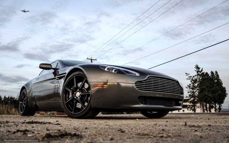 Aston Martin sports car on gravel