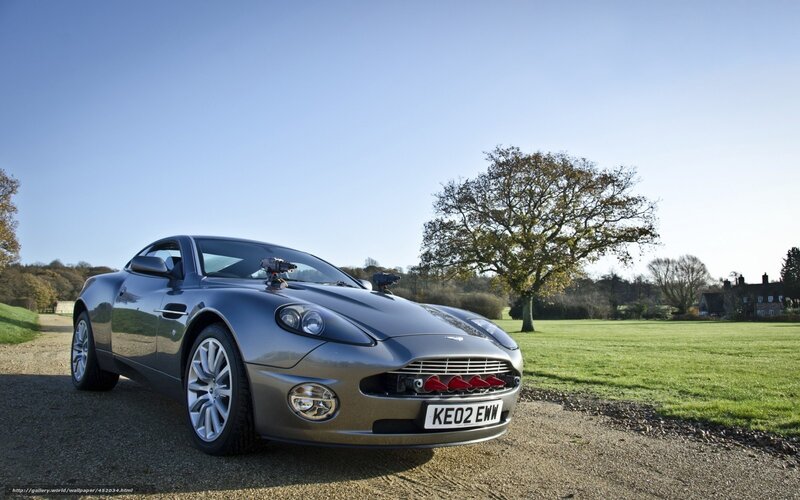 Aston Martin sports car on gravel