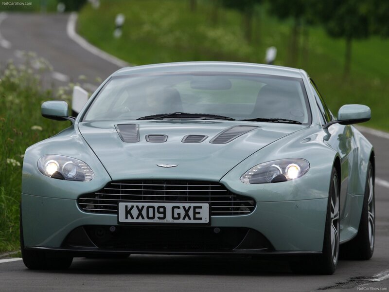 Aston Martin V12 Vantage on a country road
