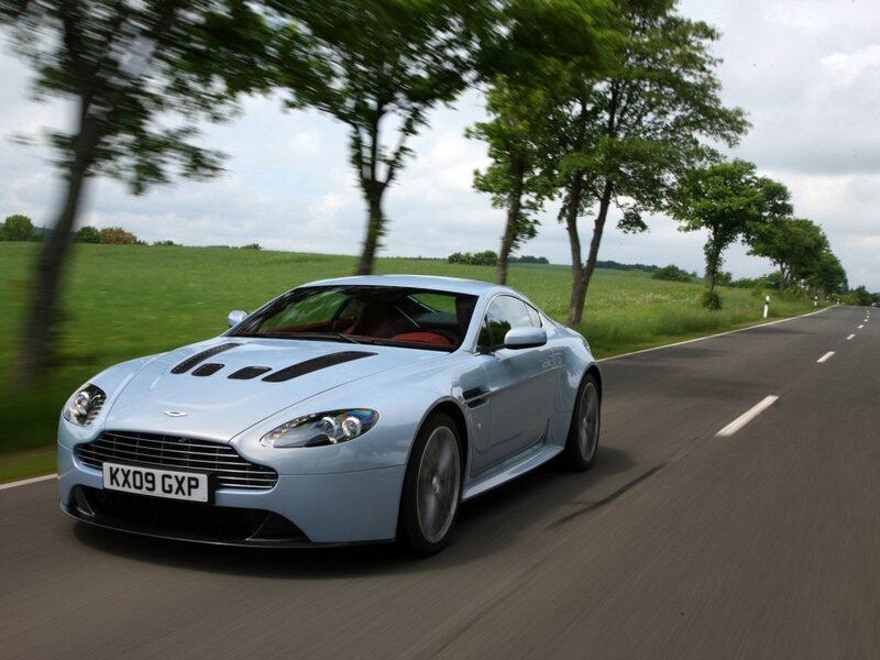 Aston Martin V12 Vantage on country road