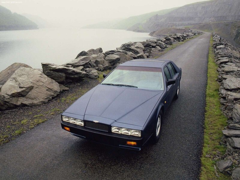 Aston Martin V8 on a coastal road