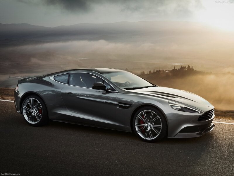 Aston Martin Vanquish on a scenic road