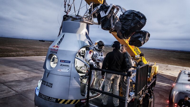 Astronaut boarding a space capsule