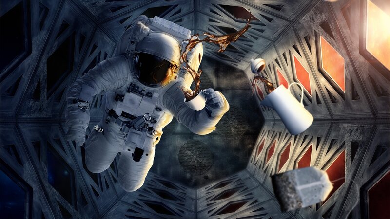 Astronaut drinking tea in space