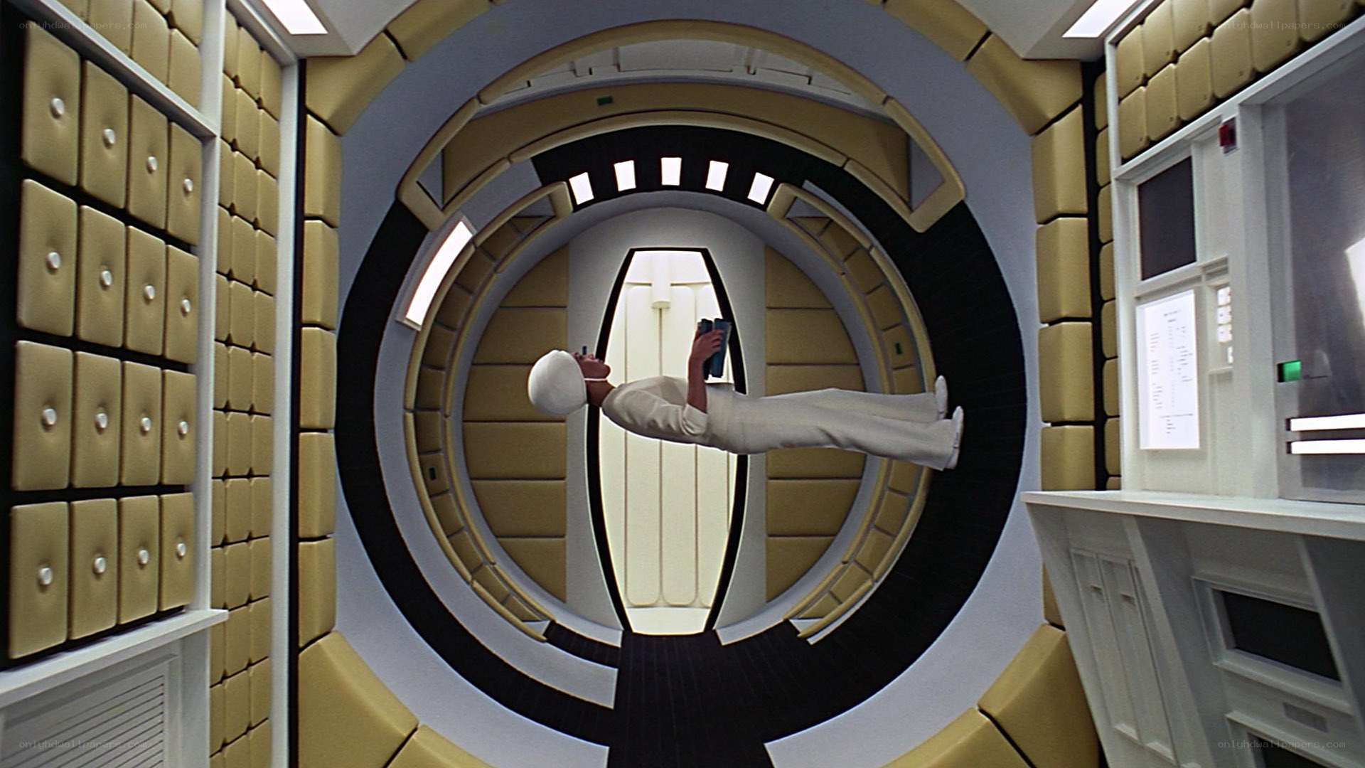 astronaut floating in spaceship corridor