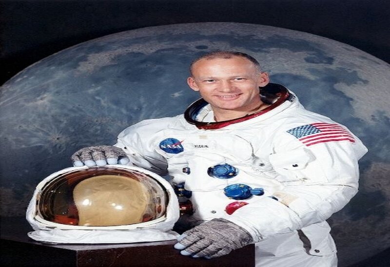 Astronaut Holding Helmet — White