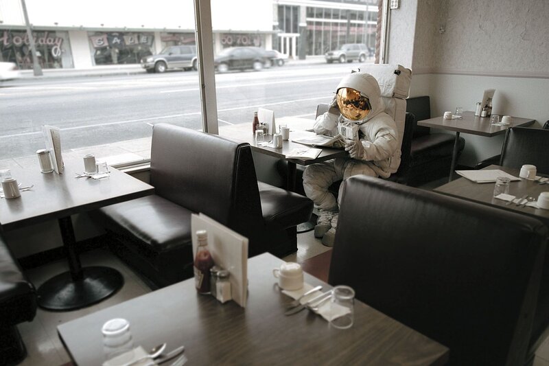 astronaut in a diner