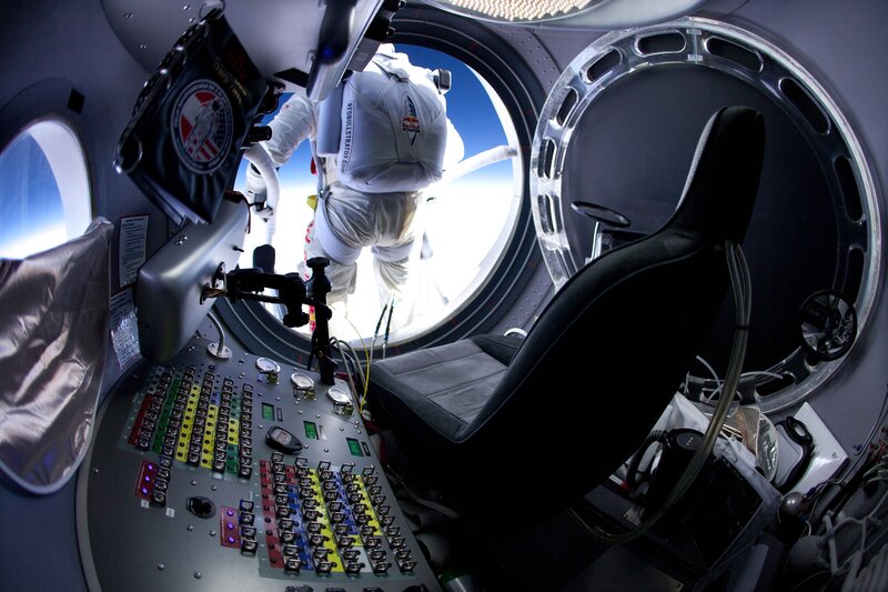 Astronaut in capsule preparing for jump
