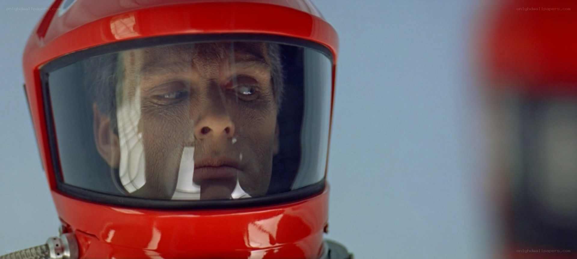 astronaut in red helmet