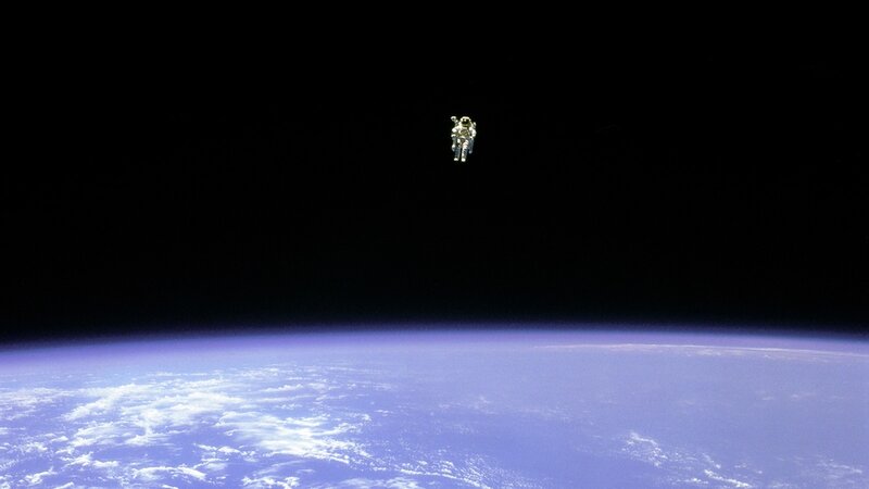 Astronaut in space above Earth