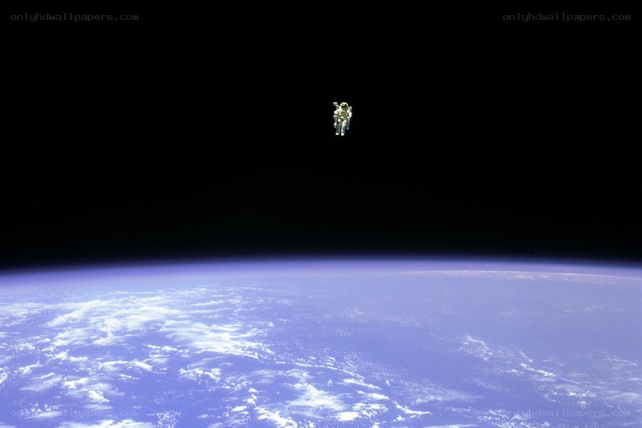 Astronaut in space above Earth