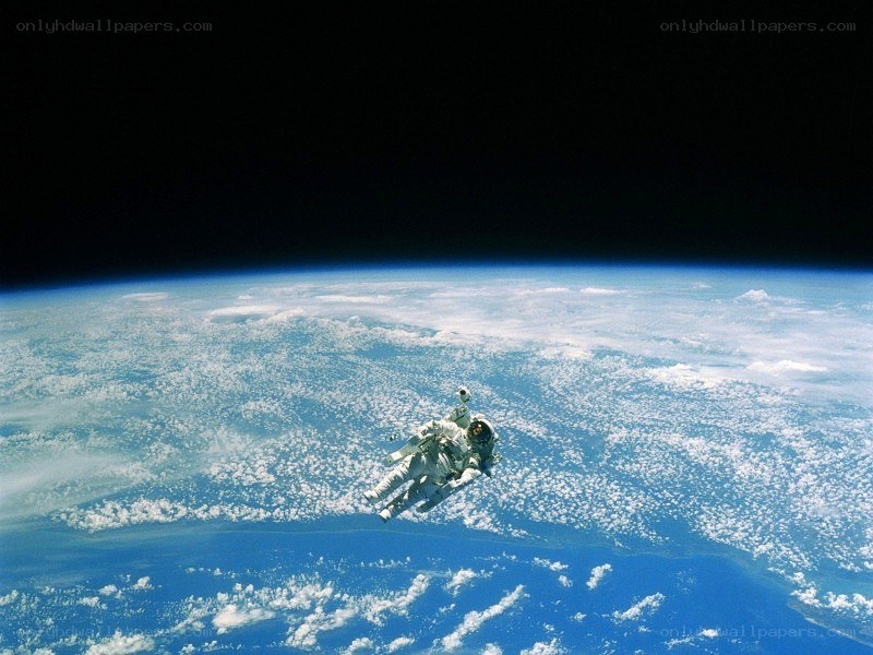 Astronaut in space above Earth