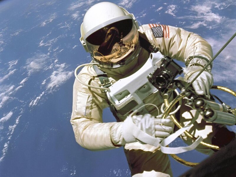 Astronaut in Space — Blue, Dramatic, Photograph, Earth, Space Suit, Camera