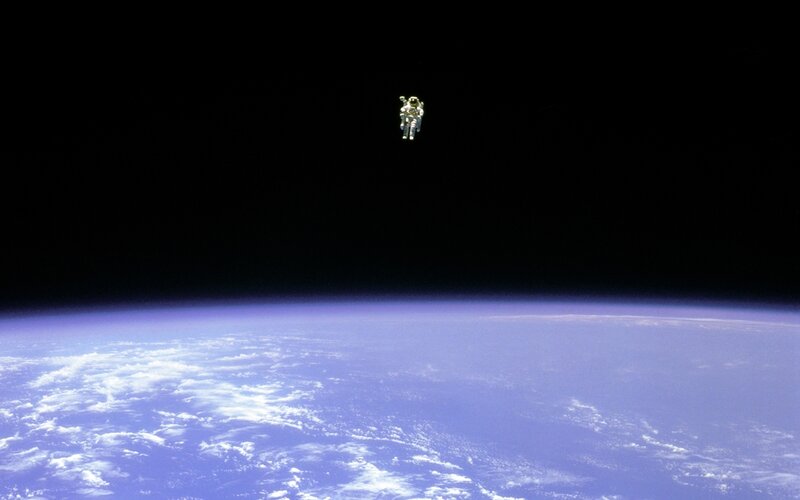 Astronaut in Space — Blue