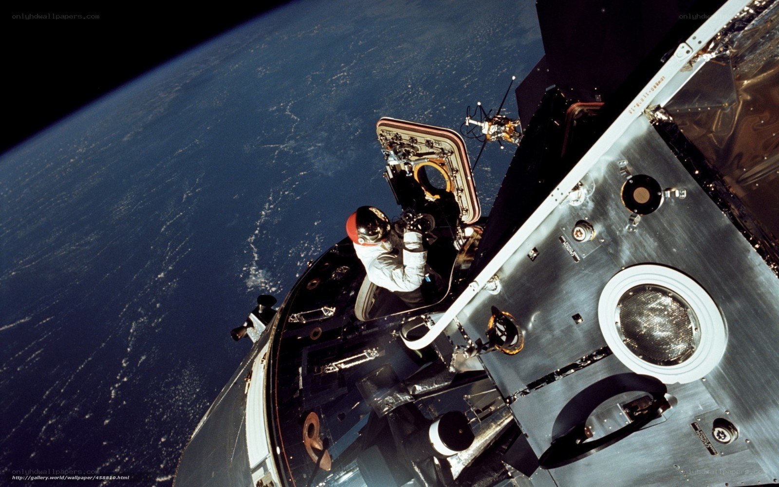 Astronaut in space capsule