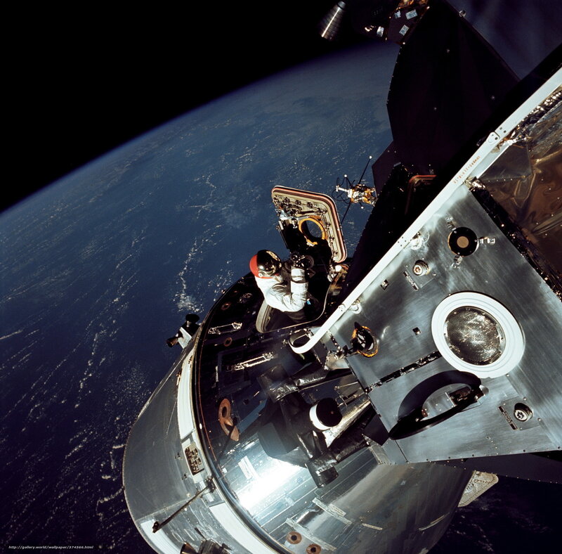 Astronaut in space capsule