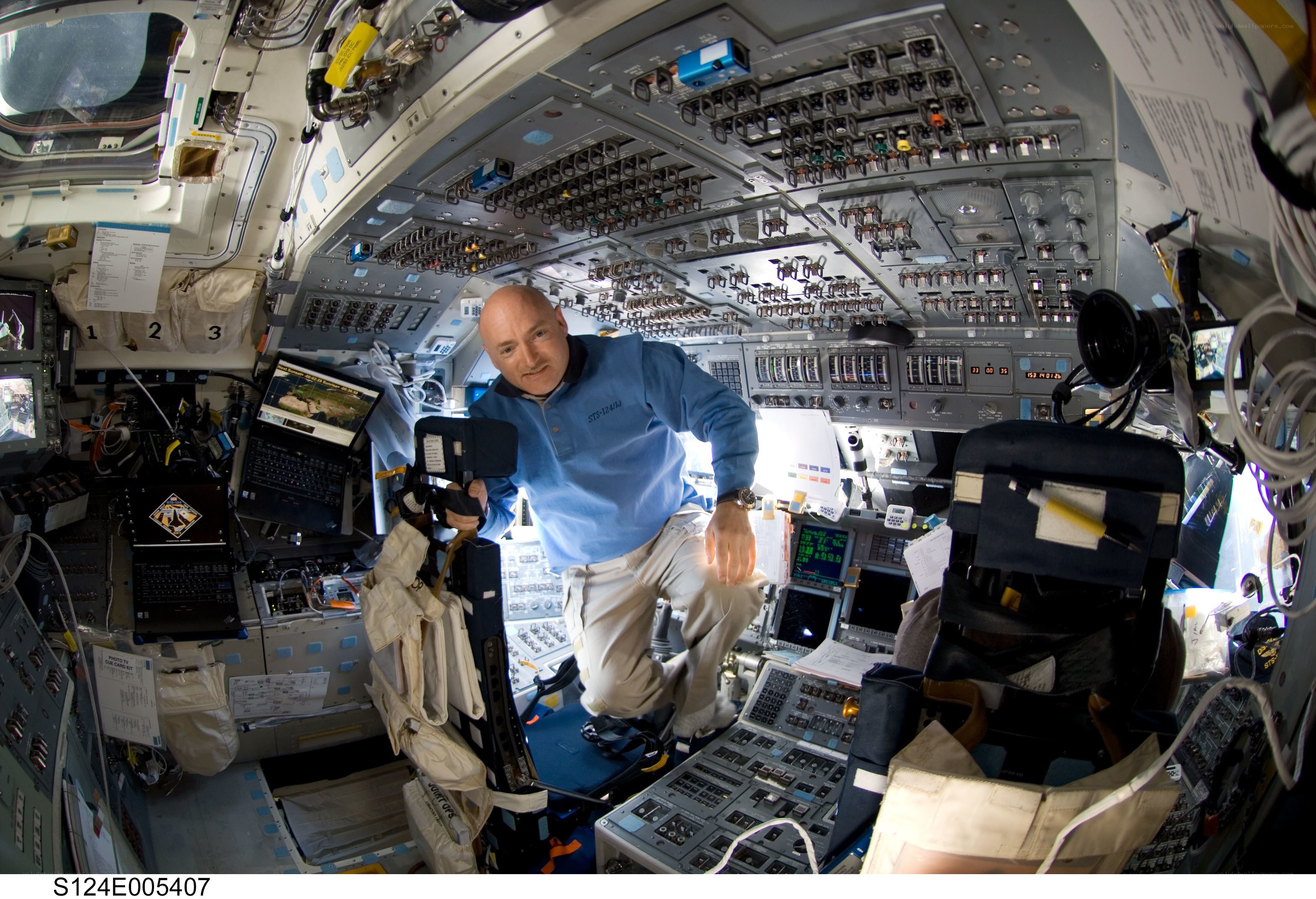 Astronaut in space station cockpit