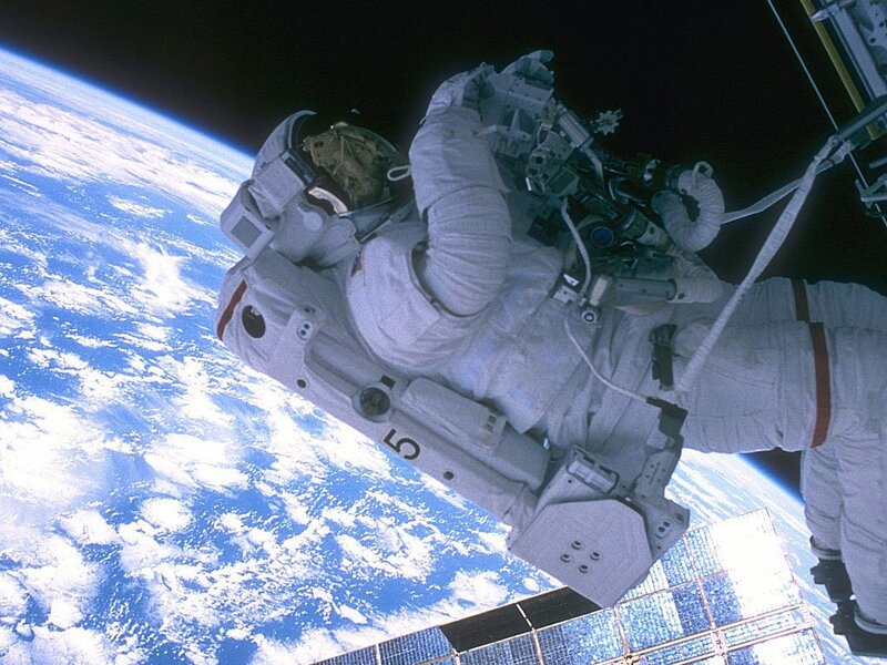 Astronaut in Space Suit — Blue, Dramatic, Photograph, Earth