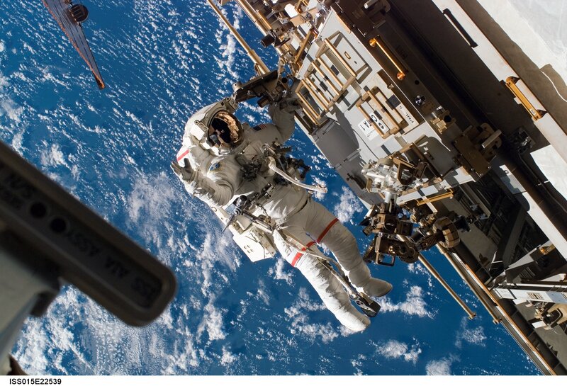 Astronaut in Space Suit — Blue, Dramatic, Photograph, Space Station