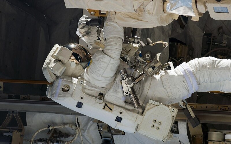 Astronaut in Space Suit — White, Dramatic, Photograph, Space Station, Helmet
