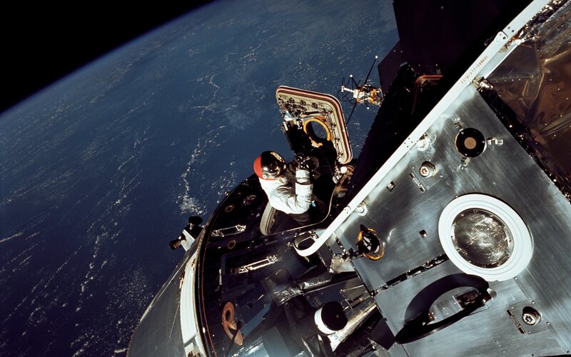 Astronaut in Spacecraft — Blue, Dramatic, Photograph, Earth