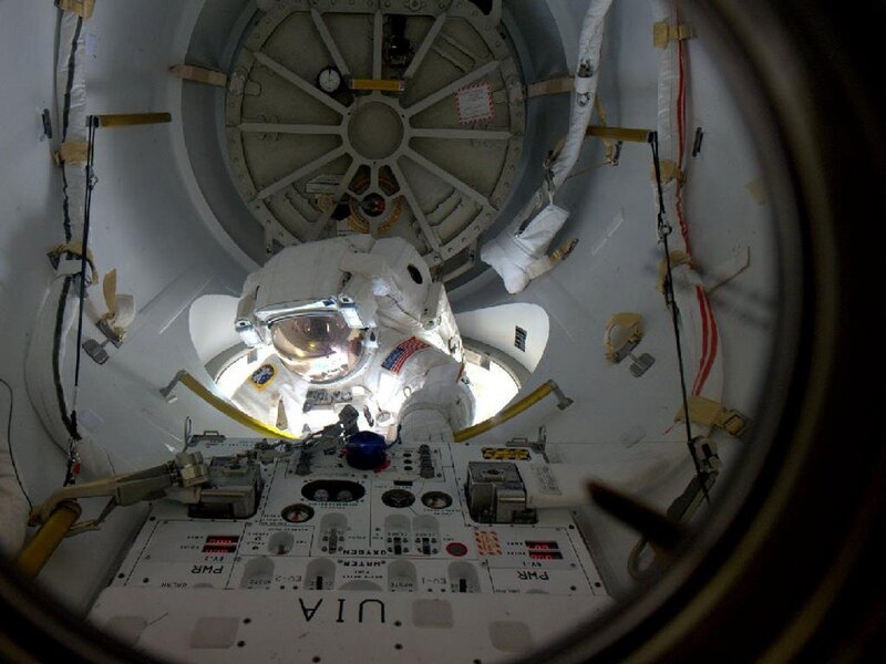 Astronaut in spacecraft module
