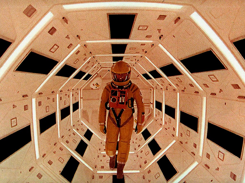 astronaut in spaceship corridor