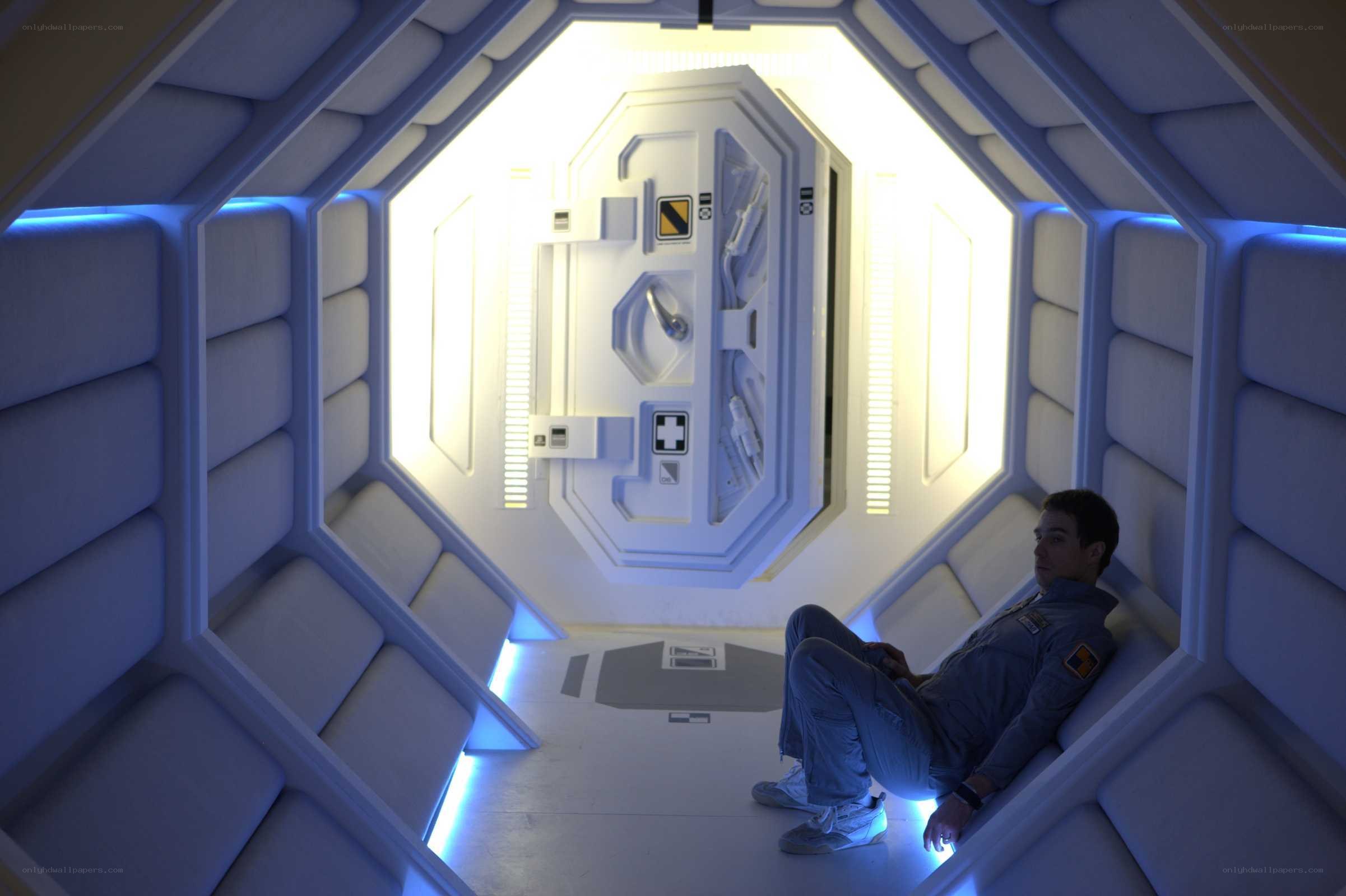 astronaut in spaceship corridor