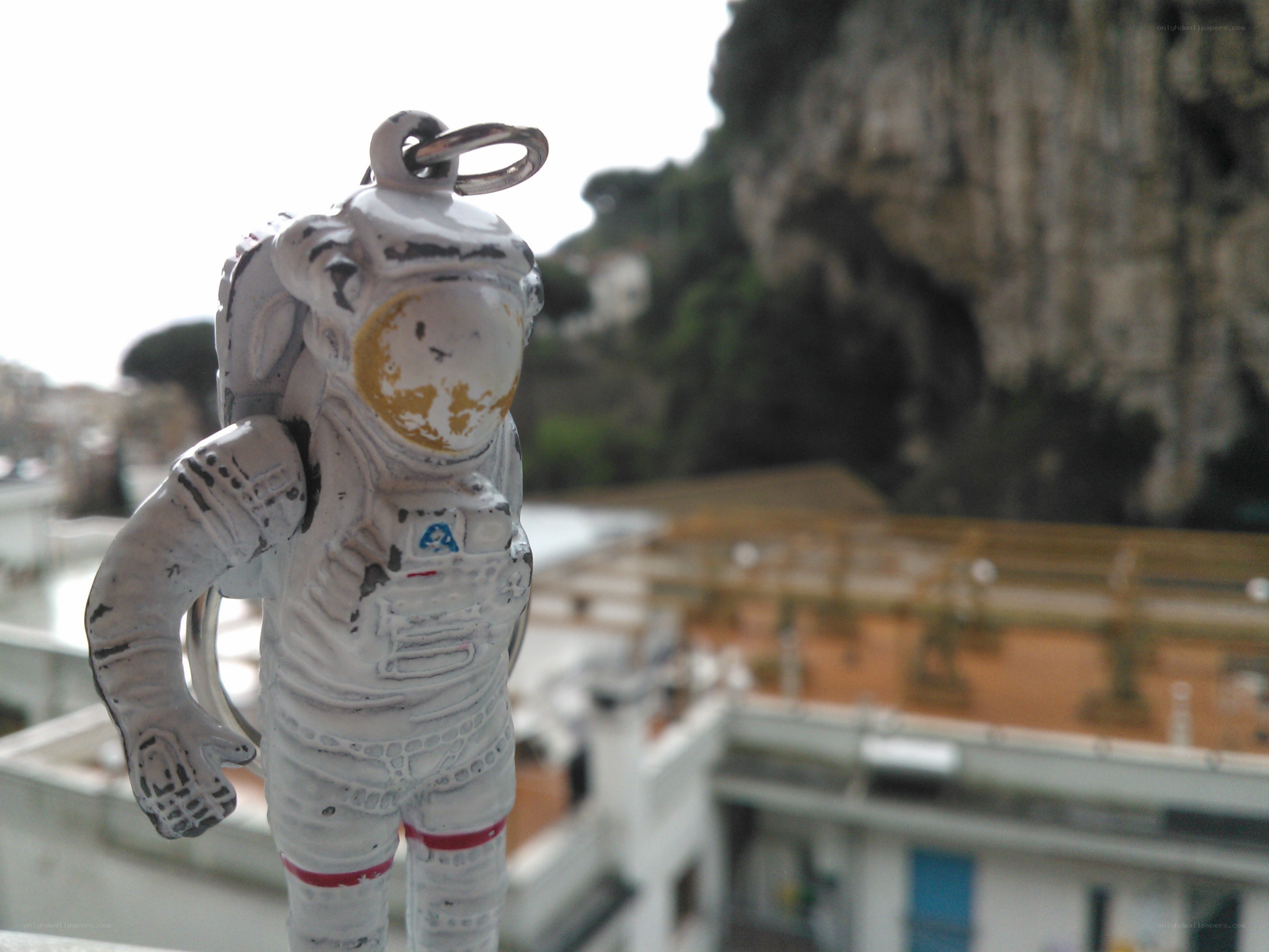 Astronaut keychain on a balcony
