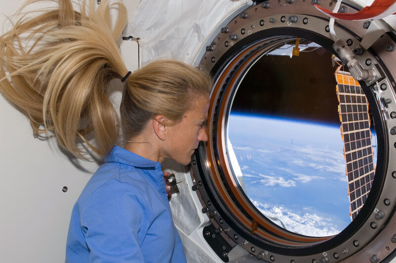 Astronaut looking at Earth