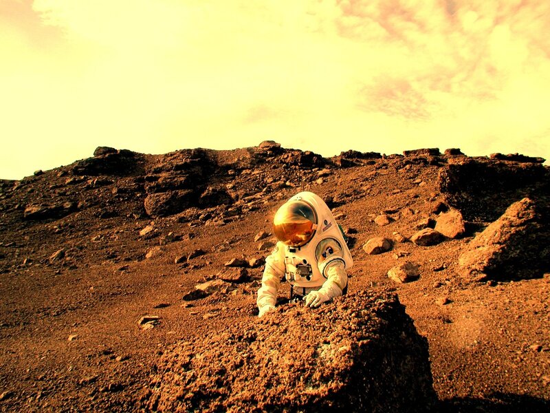 Astronaut on alien terrain