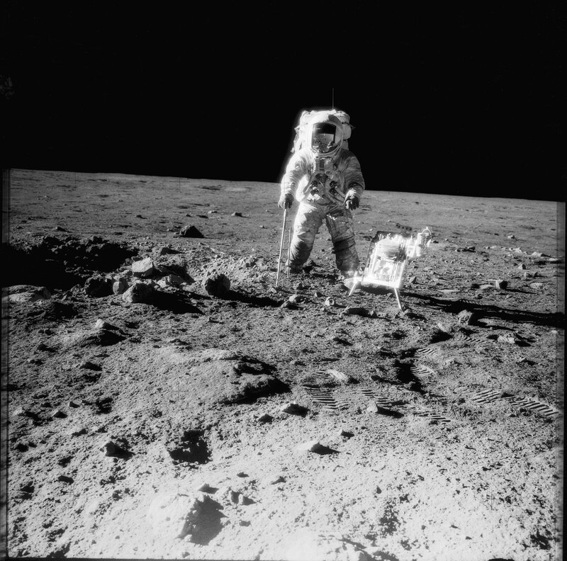 Astronaut on Moon Surface — Black, Dramatic, Photograph, Space Suit