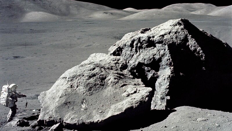 Astronaut on Moon Surface — Gray, Desolate, Photograph, Rock, Space Suit