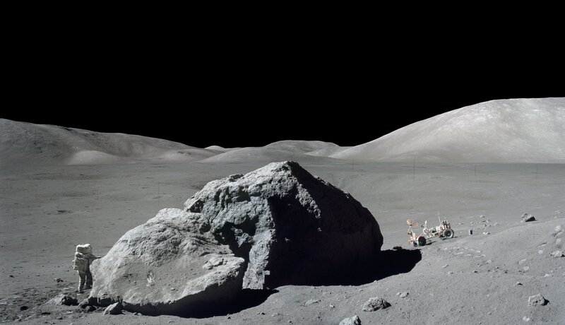 Astronaut on Moon Surface — Gray, Desolate, Photograph, Rocks