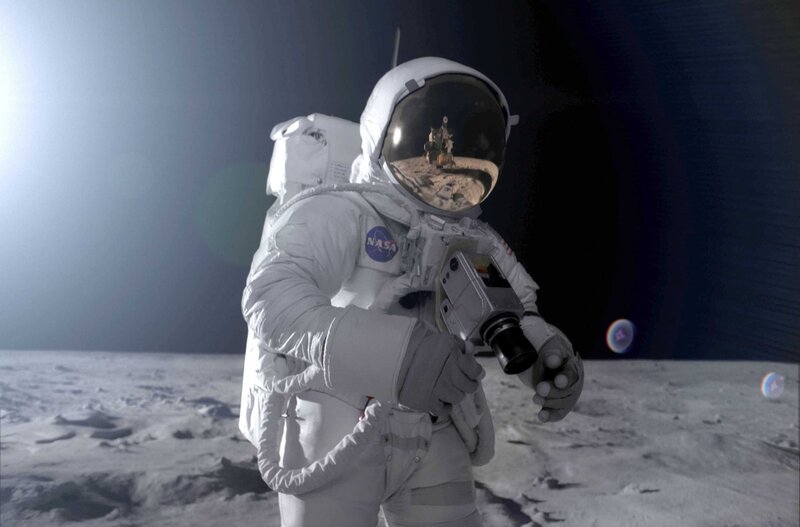 Astronaut on Moon Surface — White, Dramatic, Photograph, Moon Surface, Space Suit, Camera