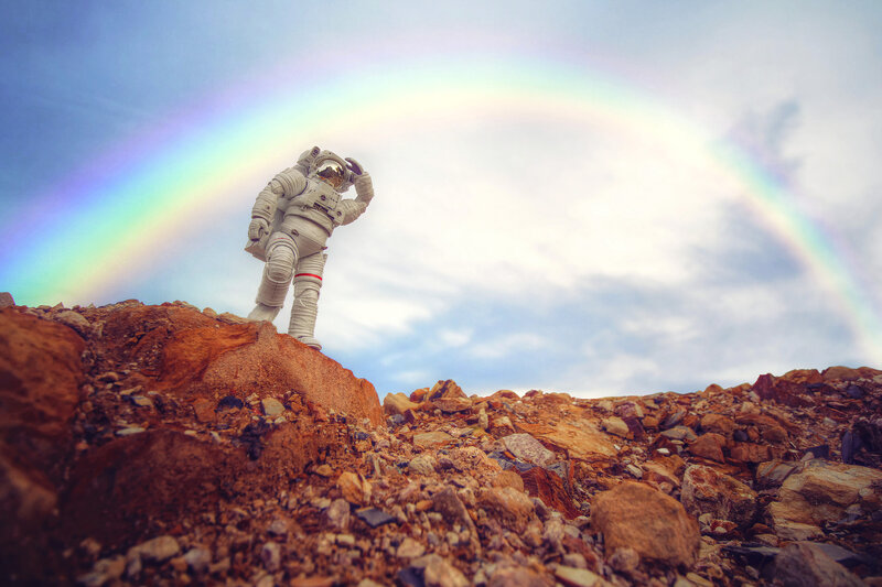 Astronaut on Rocky Terrain