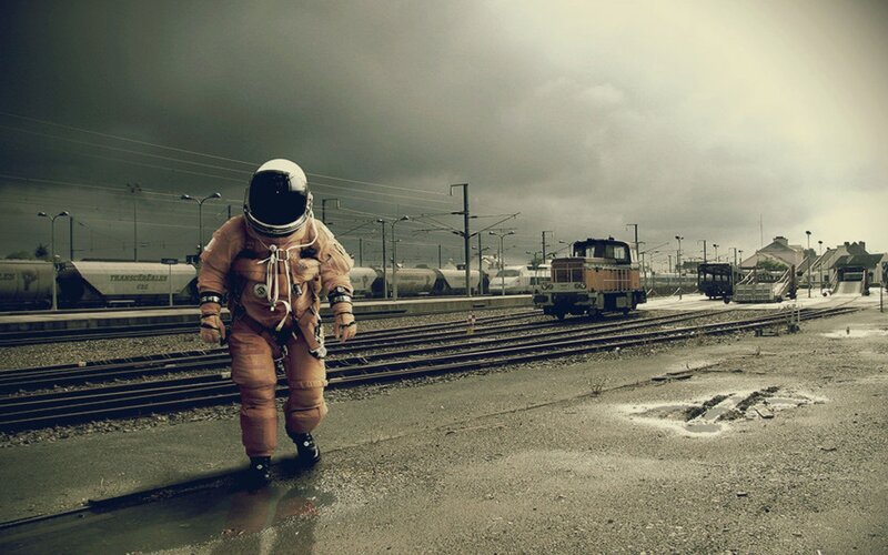 Astronaut on Train Tracks — Gray